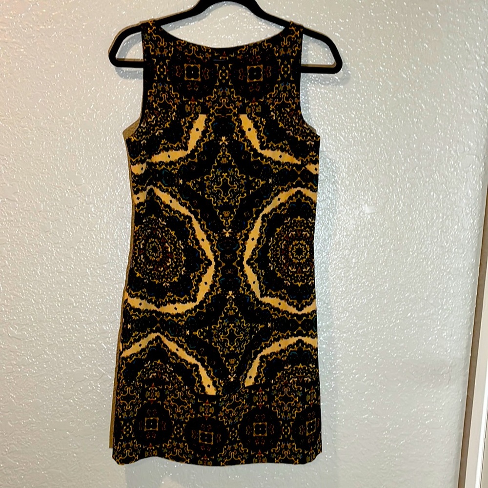 Excellent condition, lined, zipper on L side